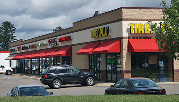 Commercial Storefront Awnings Installed by Rapid Garage Door & Awning in Grand Rapids, MN.
